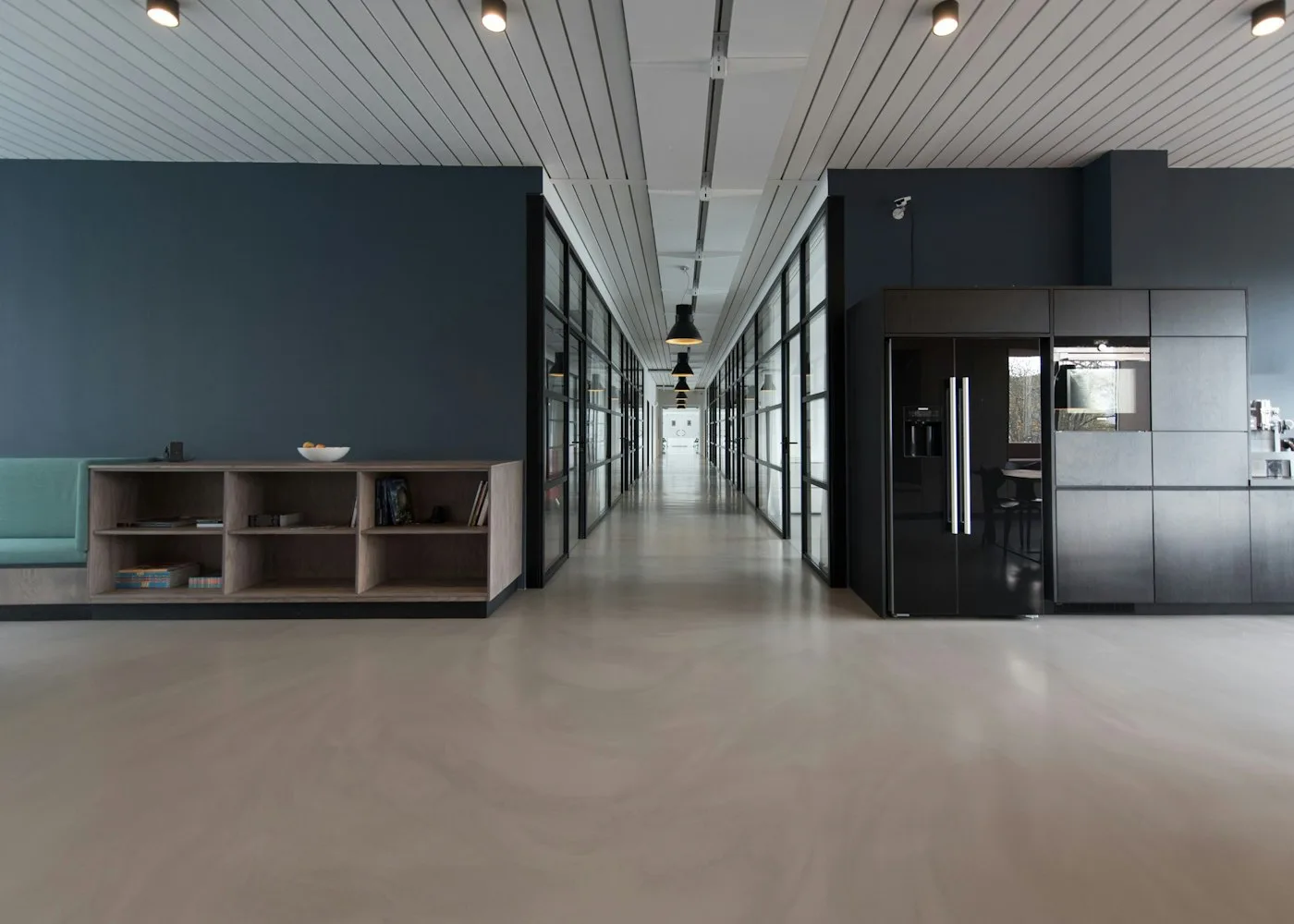 Modern Flexus-style office corridor with glass meeting rooms