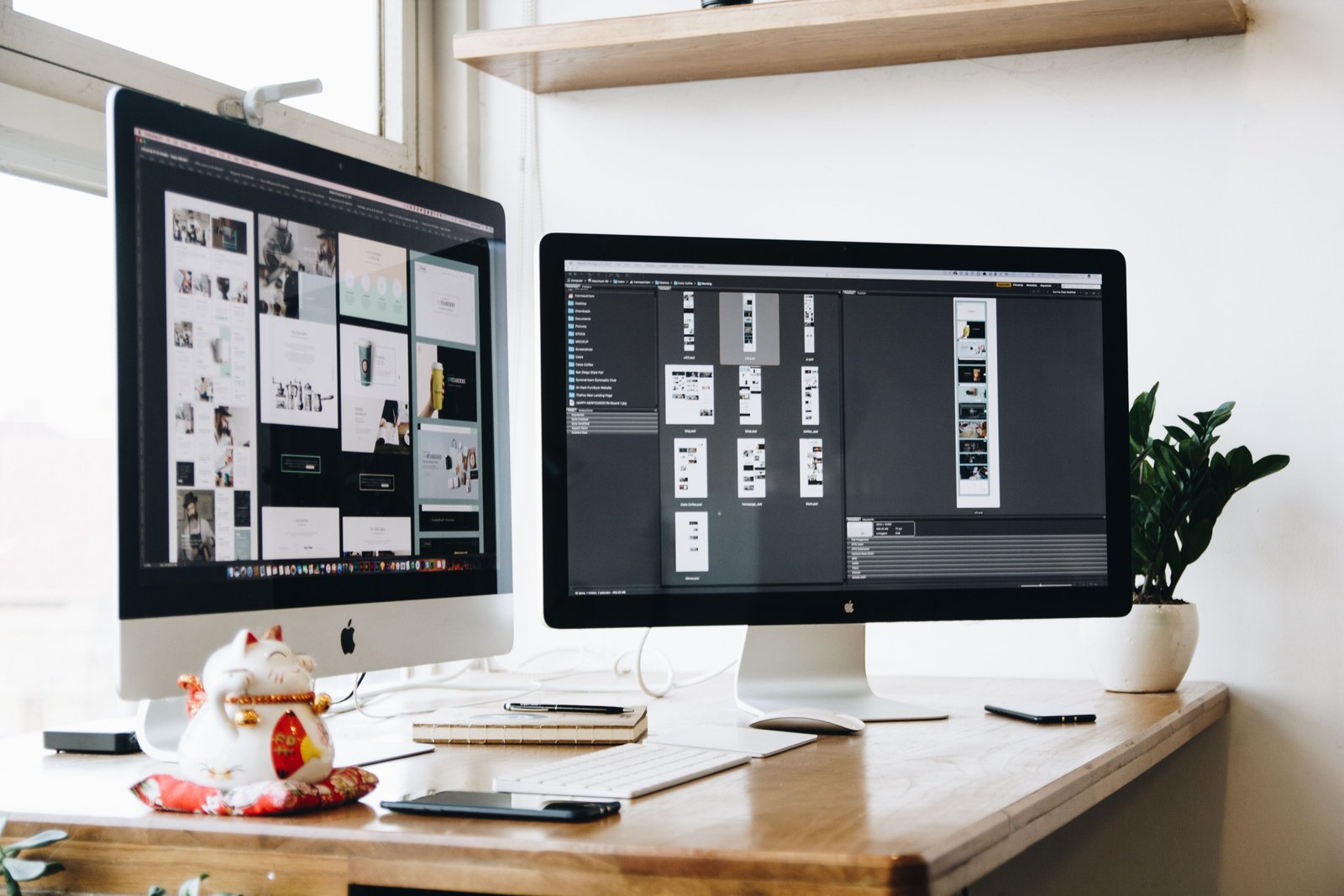 Dual-monitor workspace used for campaign management
